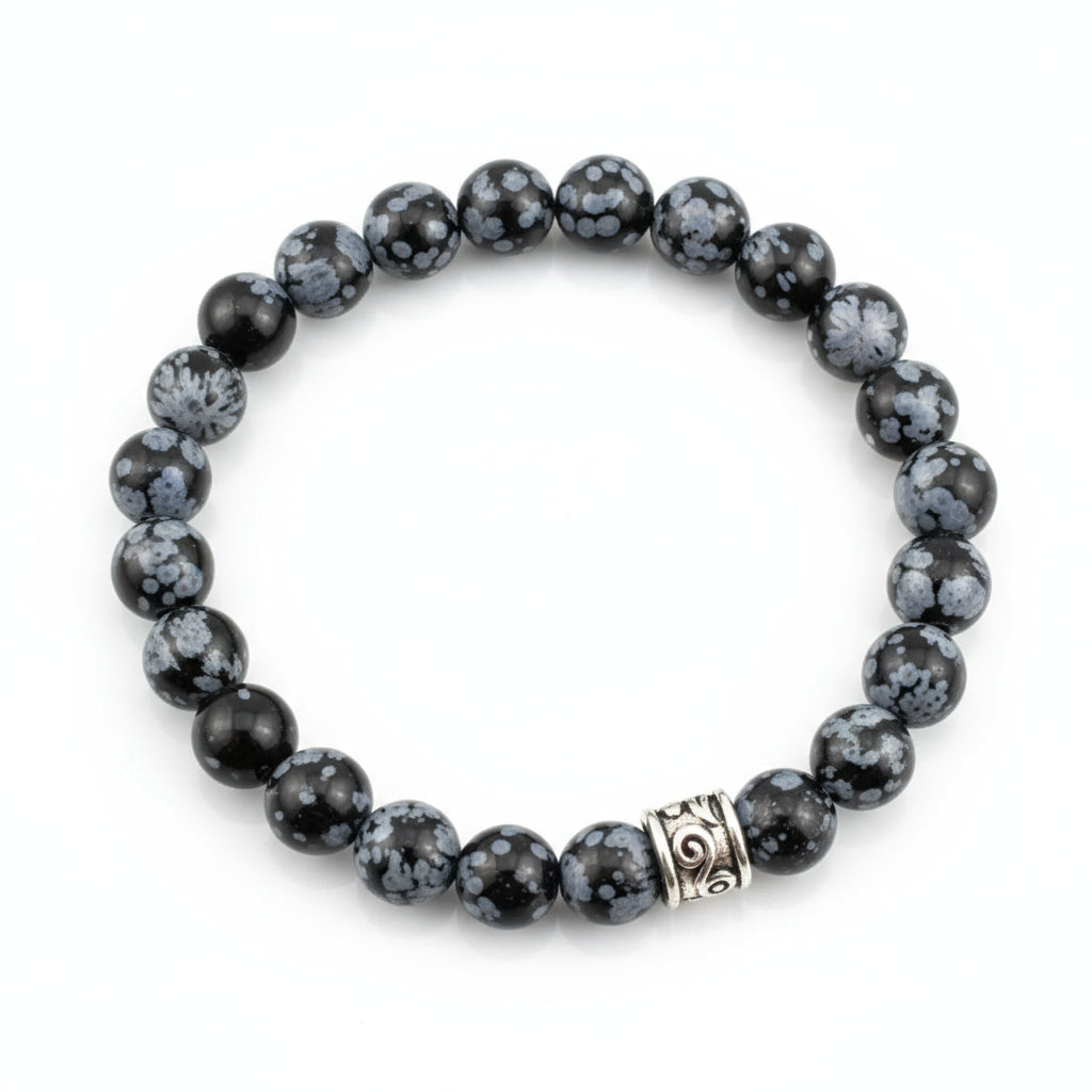 Obsidian Snowflakes beaded bracelet with a silver clasp on a white background